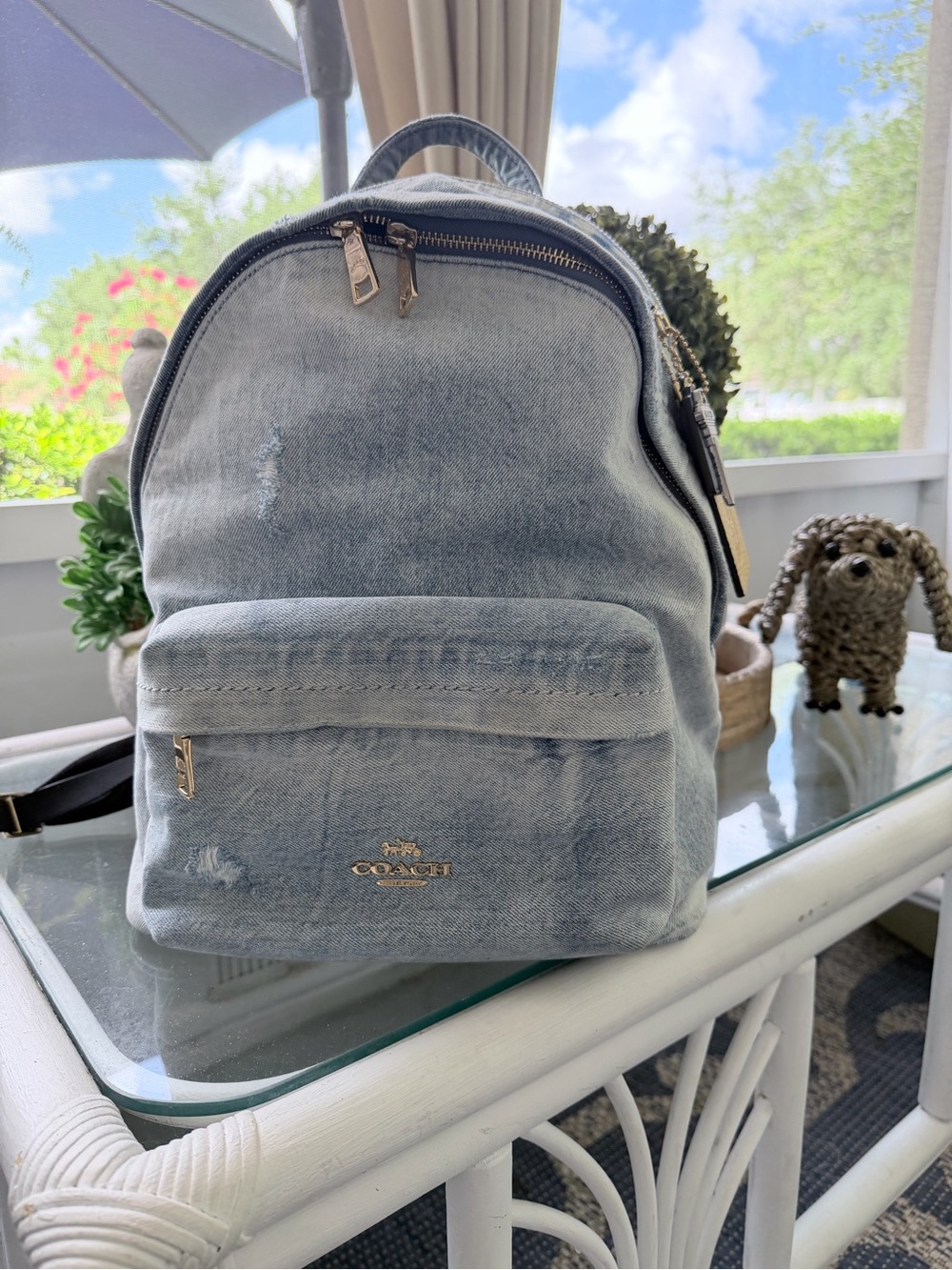 Coach Light Denim Backpack with Worn Details and fun tags